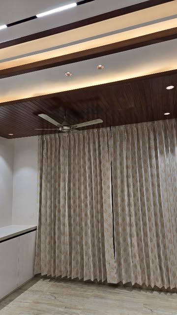 Patterned curtains fitted in a modern Jammu home